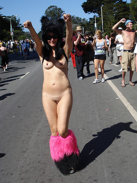 Woman Totally Nude at Parade Show