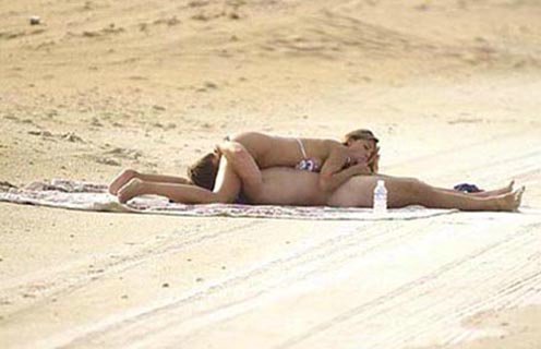 A Bikini Girl Sleeping In A Beach And Showing Boobs Photo